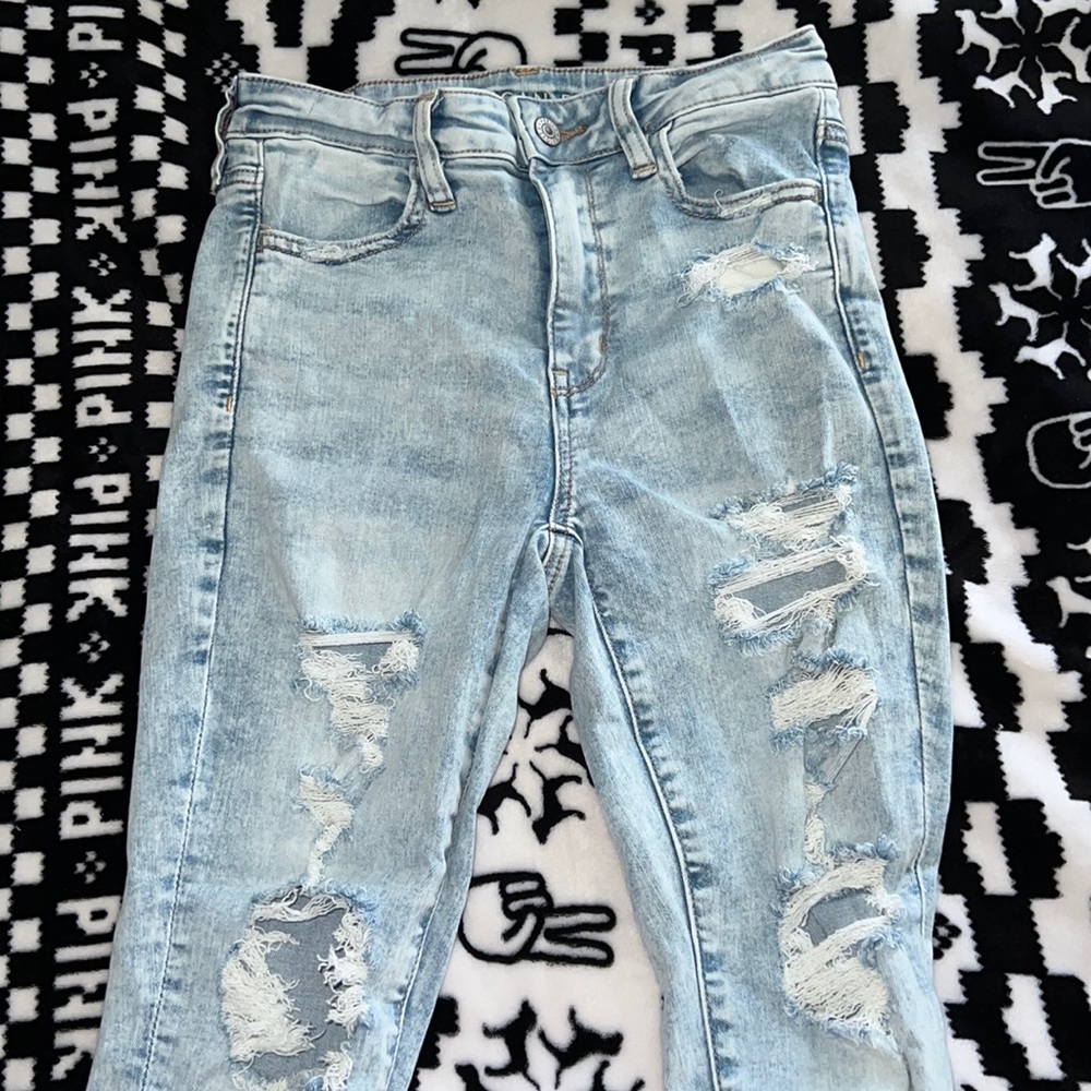 american eagle jeans, ripped. very stretchy & comfortable